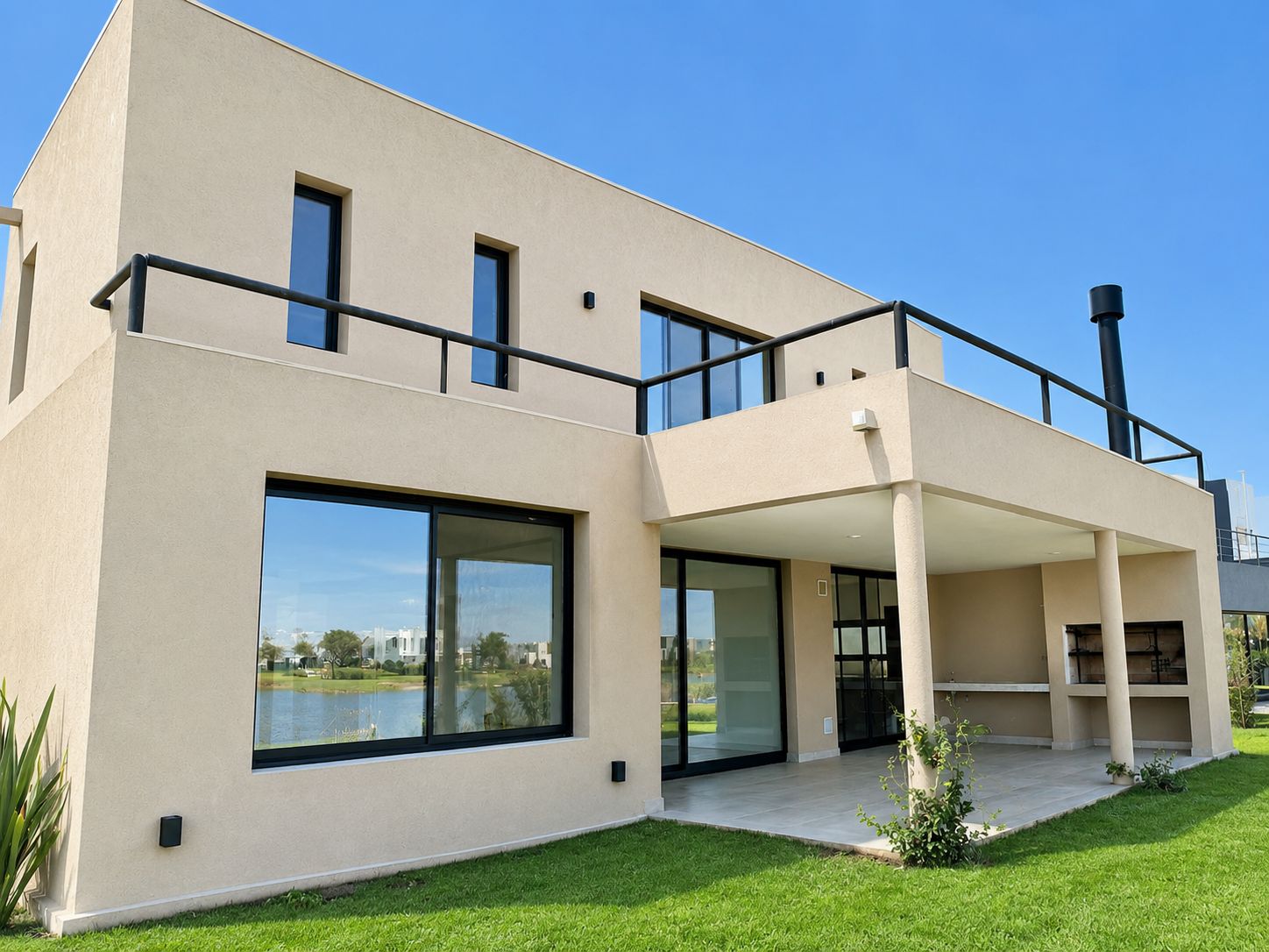 Vivienda con vista a la laguna en Barrio Santa Bárbara, Benavidez, construida por NEST